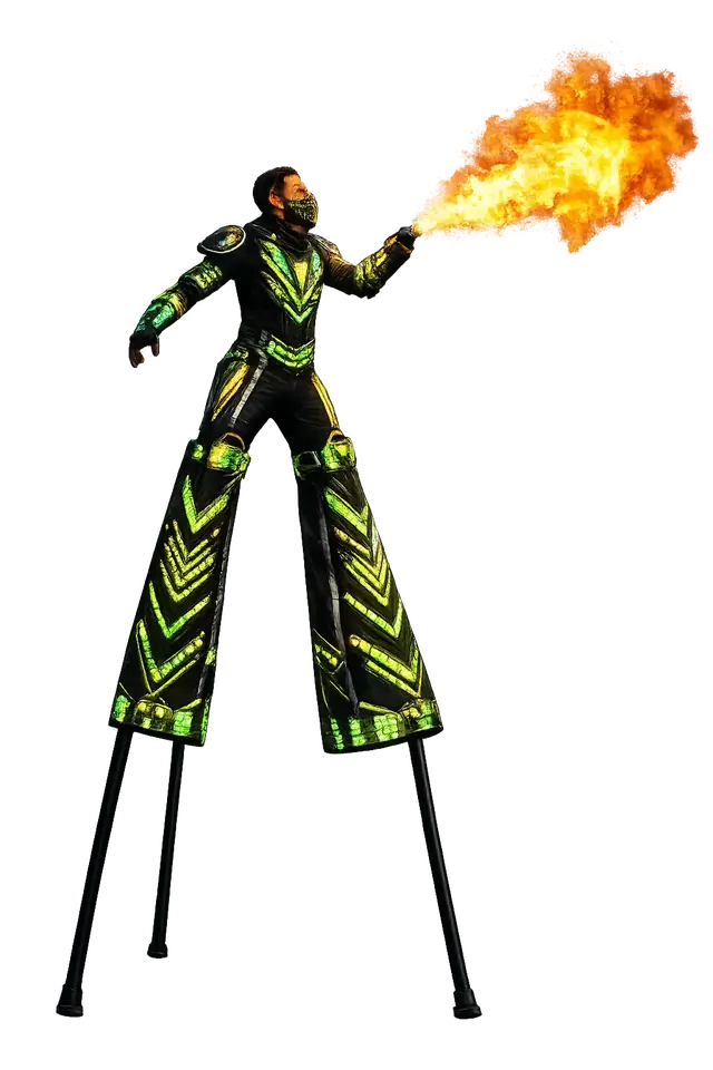 Zanquero con traje LED verde lanzando una llamarada de fuego